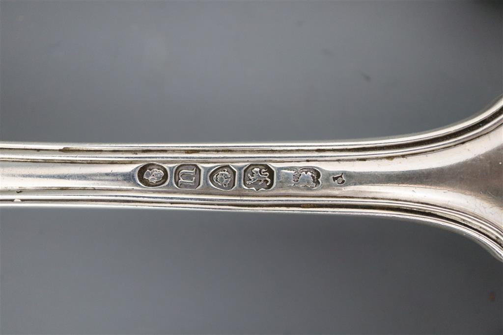 A part canteen of William IV silver double struck fiddle, thread and shell pattern flatware by William Eaton,